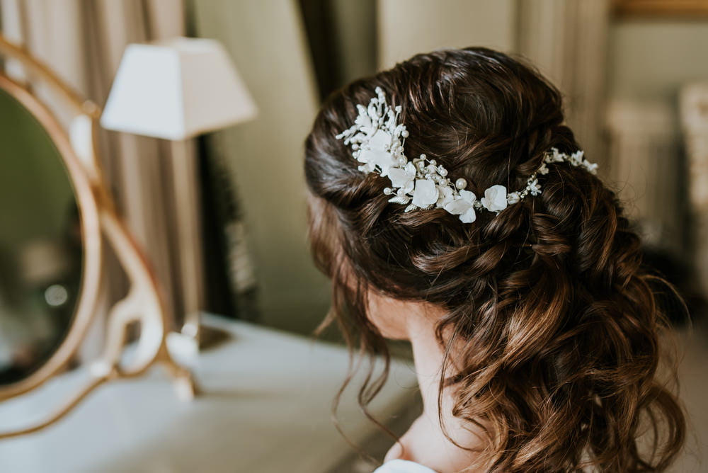 Curly Half Up Half Down Weave: 9 Best Ways To Style 9 curly-half-up-half-down-weaves-ways-to-style-and-protect